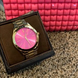 Gold and pink face Michael kors watch